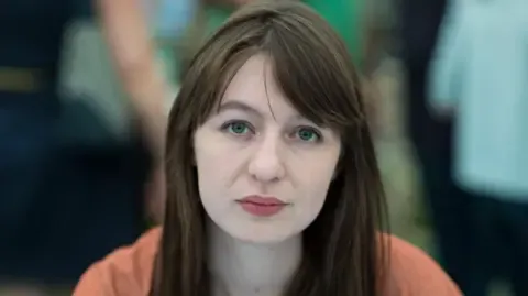 Irish author Sally Rooney declares she will not visit the UK because of potential arrest