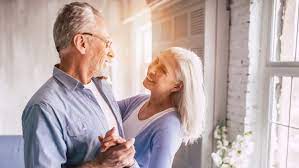 A Senior Couple Contemplate A Reverse Mortgage